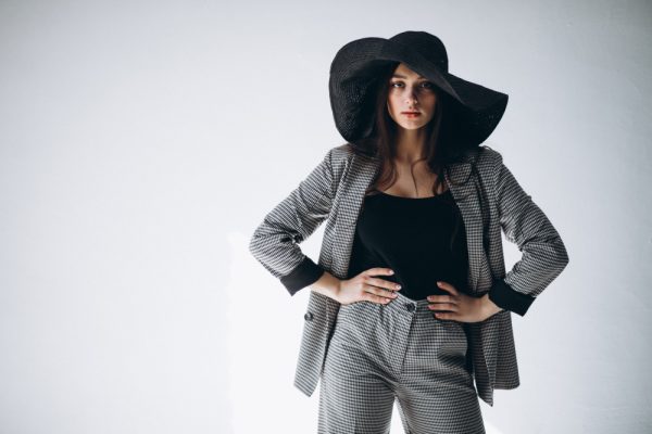 young-woman-business-suit-wearing-hat